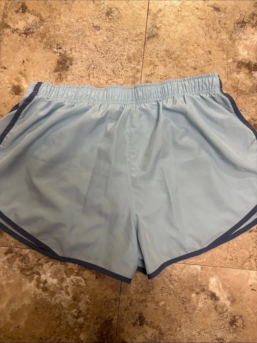 Nike - Women’s Sky Blue Athletic Shorts with Navy Trim (size X-Large)